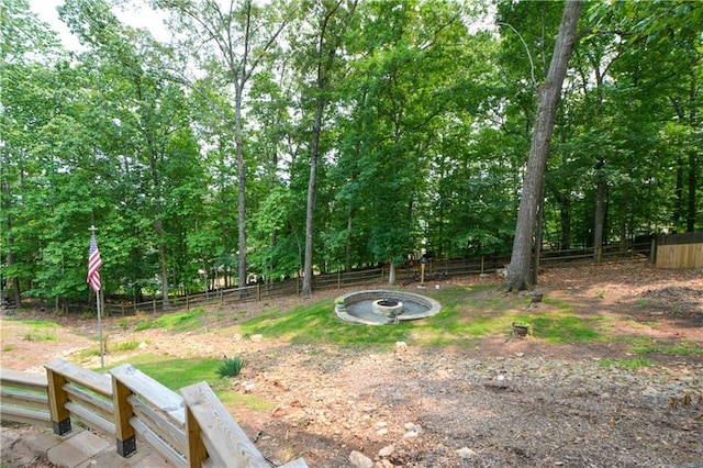 2637 Morningside Trl NW, Kennesaw, GA 30144 - fenced backyard featuring an outdoor fire pit
