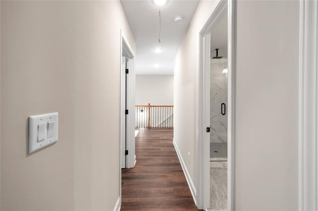 hallway with dark wood-type flooring