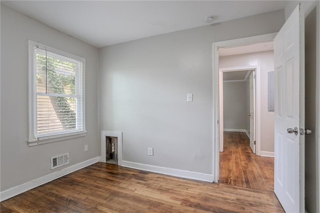 941 Reed Ave, Atlanta, GA 30344 - empty room with wood finished floors, baseboards, and a smoke detector