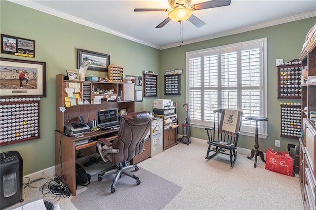 office with crown molding, carpet flooring, baseboards, and ceiling fan