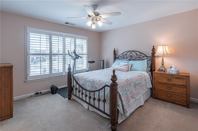 bedroom featuring visible vents, carpet flooring, baseboards, and ceiling fan