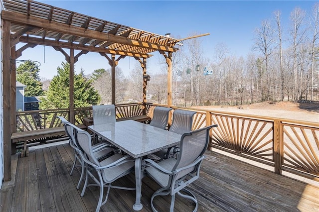 wooden terrace featuring outdoor dining space and a pergola