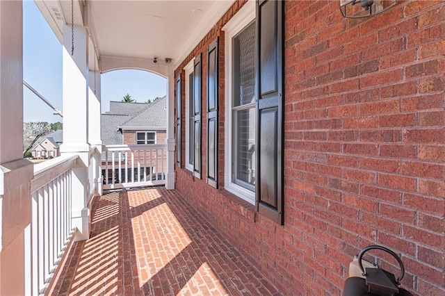 balcony featuring covered porch