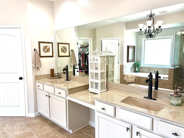 4745 Belcrest Way, Cumming, GA 30040 - full bath with tile patterned floors, vanity, a tub, a chandelier, and a spacious closet