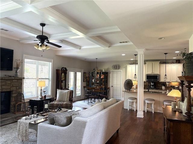4745 Belcrest Way, Cumming, GA 30040 - living room featuring coffered ceiling, dark wood-type flooring, a ceiling fan, beamed ceiling, and crown molding
