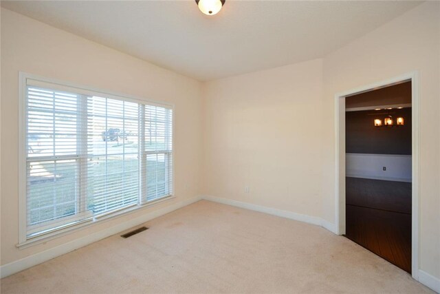 empty room with carpet flooring