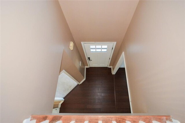 doorway to outside with dark hardwood / wood-style floors