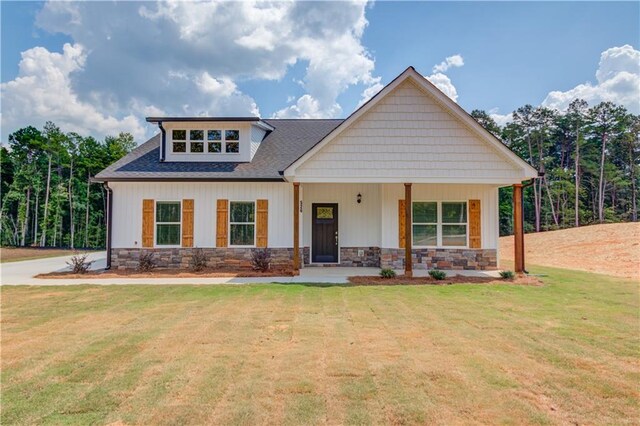 0 Dortch Rd, Eastanollee, GA 30538 - view of front facade with a front yard, a chimney, an attached garage, and driveway