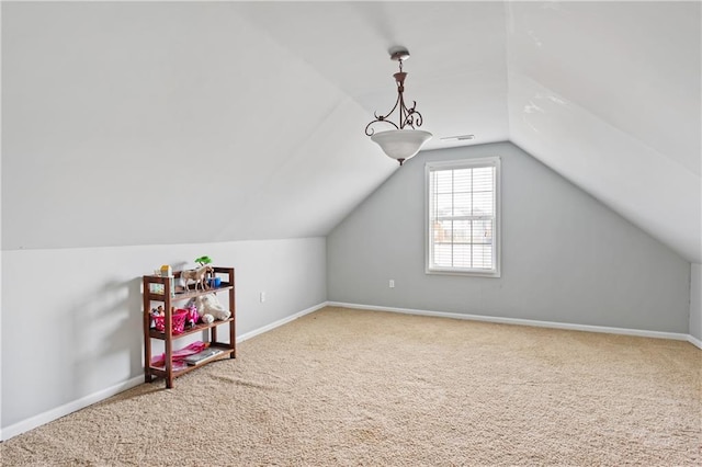 bonus room with vaulted ceiling, visible vents, baseboards, and carpet floors