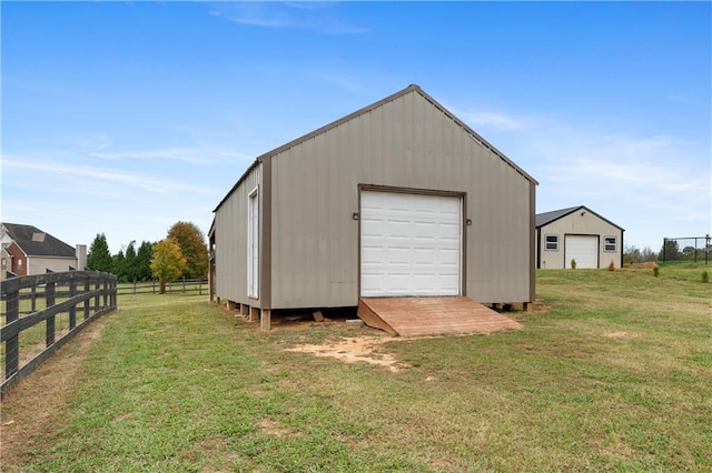 view of outdoor structure featuring an outdoor structure and fence