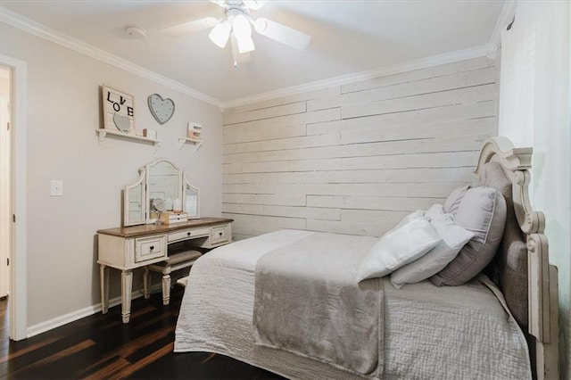 bedroom featuring wood walls, baseboards, ornamental molding, and dark wood-type flooring