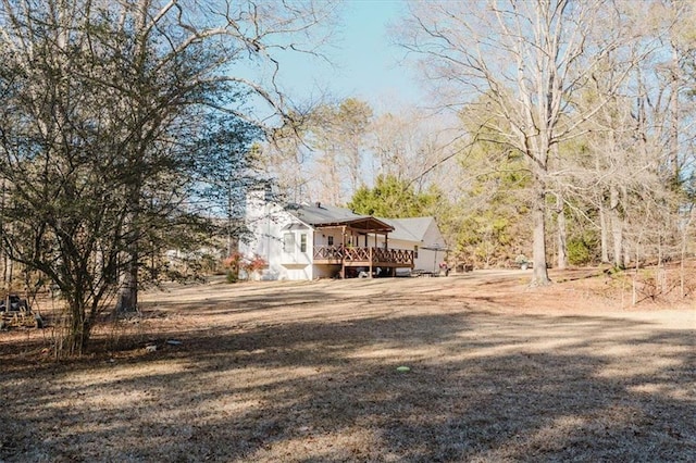 view of yard featuring a deck