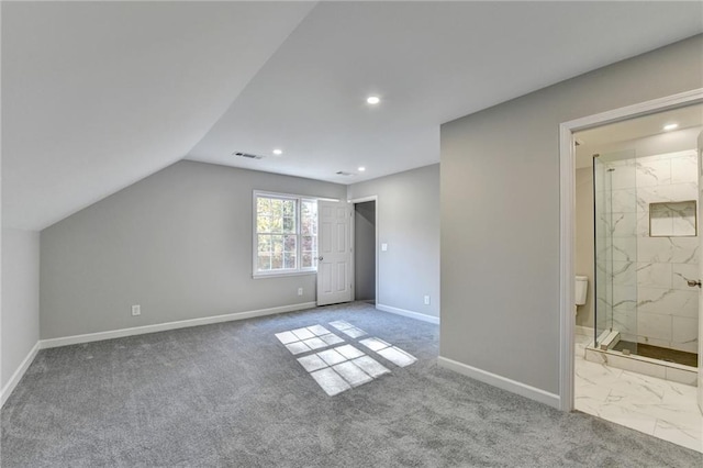 additional living space with carpet and vaulted ceiling