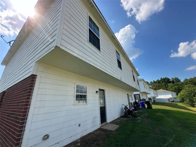 630 Mill Stone Blf Unit B, Monroe, GA 30655 - back of house featuring a yard