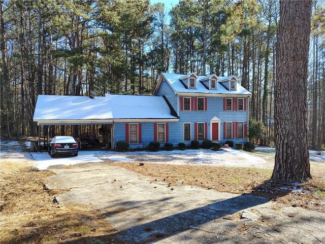 view of front of house with a carport