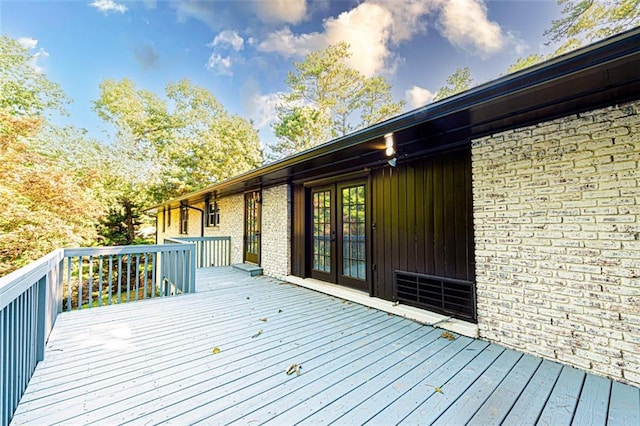 wooden terrace featuring french doors