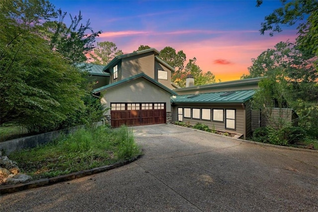 view of front of home with a garage