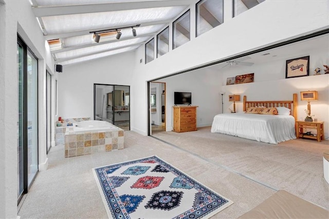 bedroom with high vaulted ceiling and carpet flooring