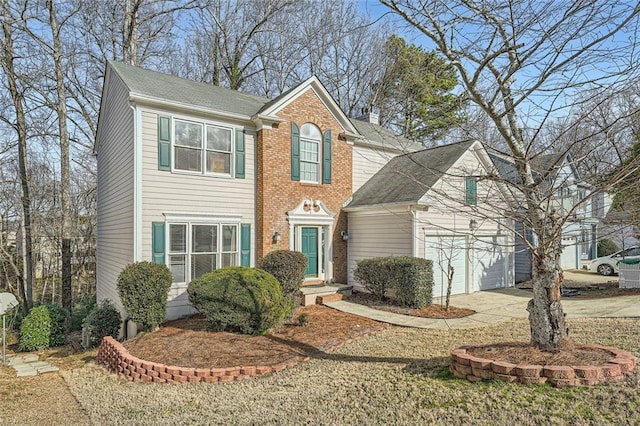 view of front of property with a garage