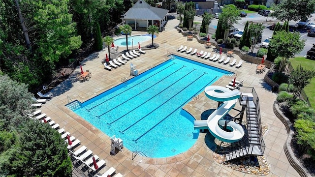 4478 Longmead Rd, Flowery Branch, GA 30542 - community pool with a water slide and a patio