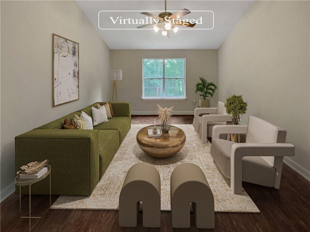 living room with ceiling fan, hardwood / wood-style flooring, and vaulted ceiling