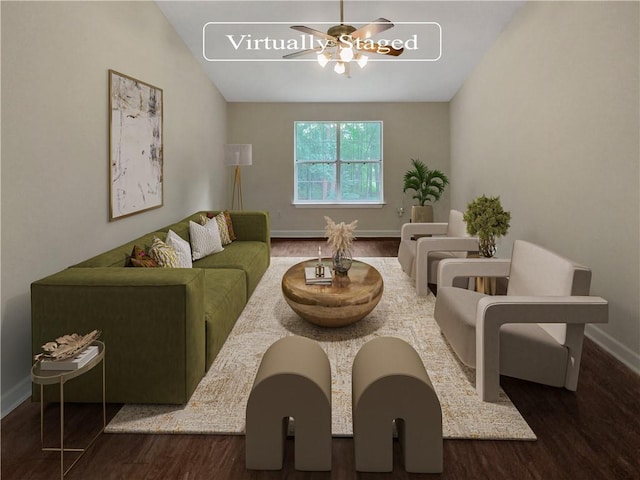 living room with ceiling fan and dark wood-type flooring