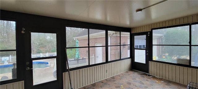 view of unfurnished sunroom