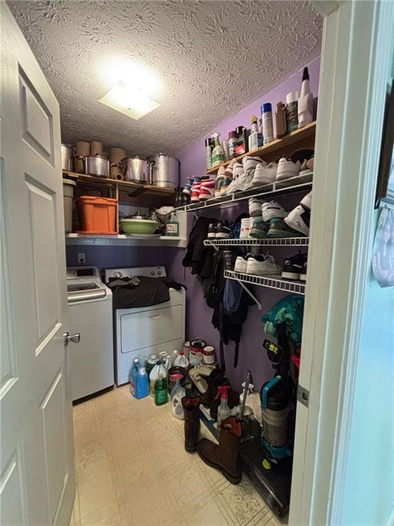 storage room featuring independent washer and dryer