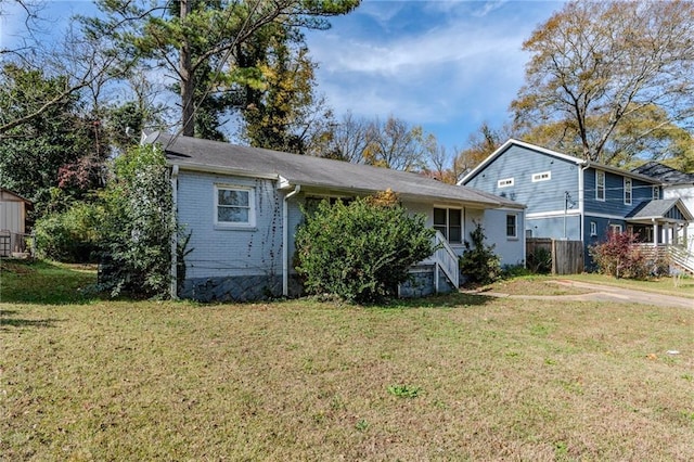 view of front of home with a front yard