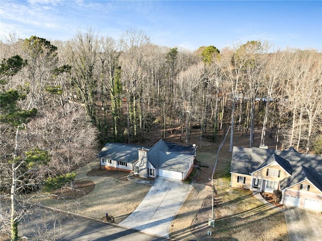 drone / aerial view with a forest view