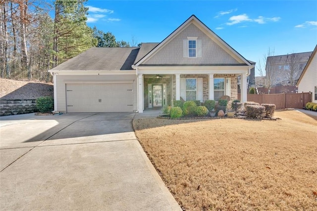 view of front facade featuring a garage and a front lawn