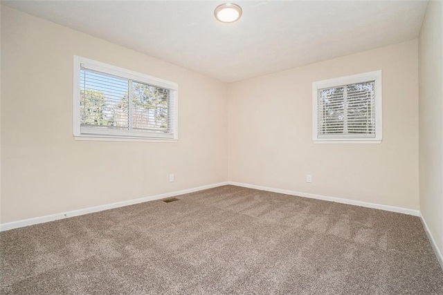 view of carpeted spare room