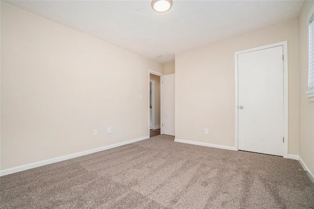 spare room with carpet flooring