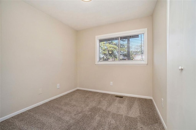 unfurnished room featuring carpet floors