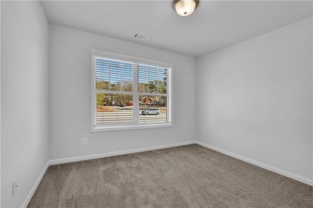 view of carpeted spare room