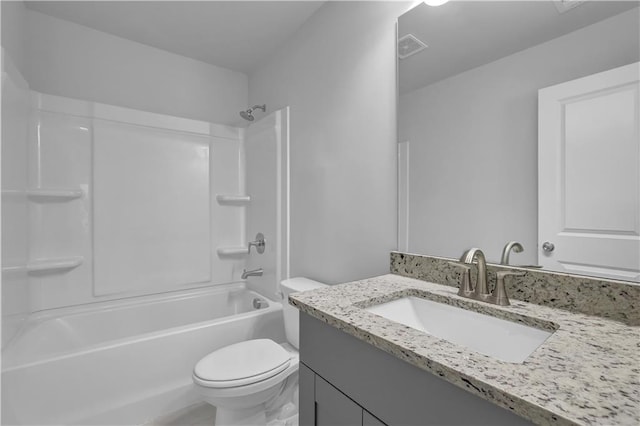 full bathroom featuring shower / tub combination, vanity, and toilet