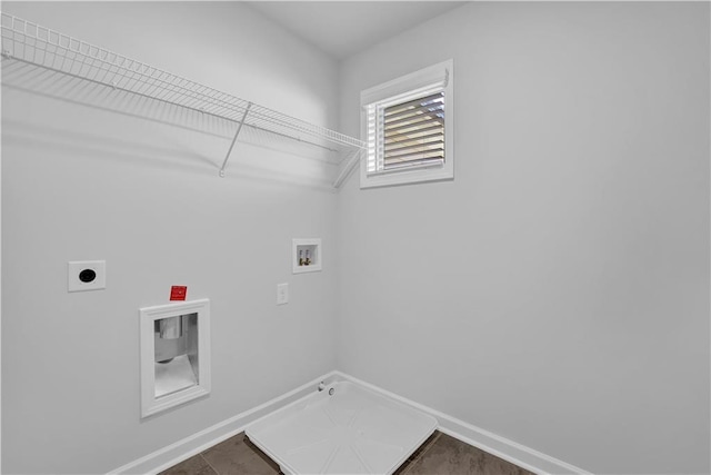 laundry area with hookup for an electric dryer, hookup for a gas dryer, and hookup for a washing machine