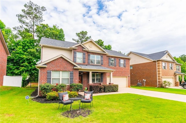 12275 Styron Dr, Hampton, GA 30228 - view of front of property with an attached garage, driveway, and brick siding