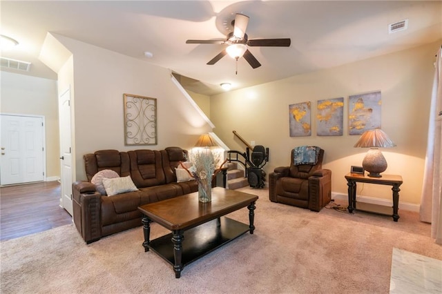 12275 Styron Dr, Hampton, GA 30228 - living area featuring light carpet, a ceiling fan, and baseboards