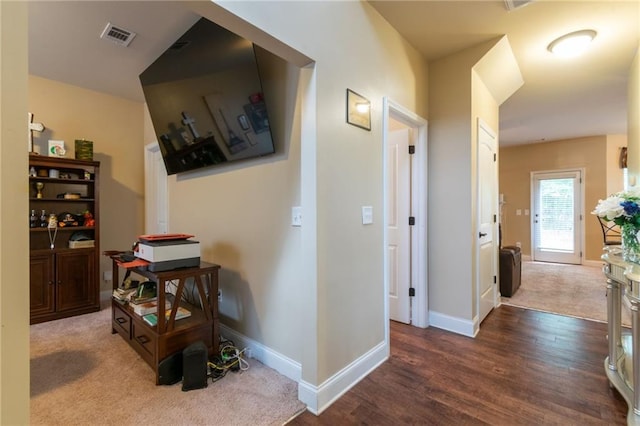 12275 Styron Dr, Hampton, GA 30228 - hall featuring baseboards, carpet floors, and wood finished floors
