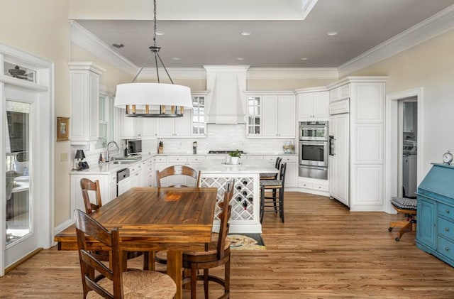 803 Night Fire Dr, Dawsonville, GA 30534 - dining space with ornamental molding, light wood-style flooring, and recessed lighting