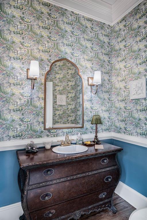 803 Night Fire Dr, Dawsonville, GA 30534 - bathroom with wallpapered walls, wood finished floors, vanity, and crown molding