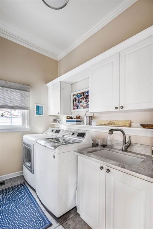 803 Night Fire Dr, Dawsonville, GA 30534 - clothes washing area featuring a sink, light tile patterned flooring, separate washer and dryer, cabinet space, and ornamental molding