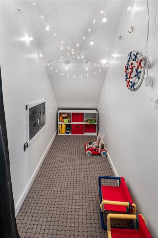 803 Night Fire Dr, Dawsonville, GA 30534 - recreation room with lofted ceiling, baseboards, and carpet flooring