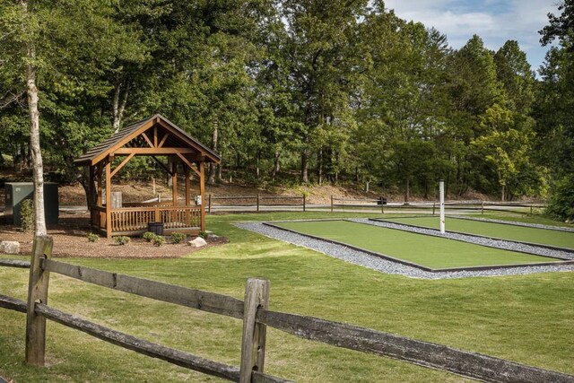 803 Night Fire Dr, Dawsonville, GA 30534 - view of home's community featuring a lawn, a gazebo, and fence