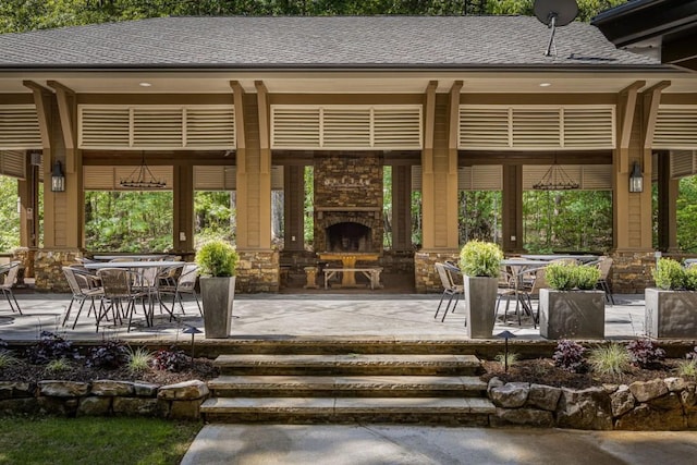 803 Night Fire Dr, Dawsonville, GA 30534 - view of patio with an outdoor stone fireplace and outdoor dining space