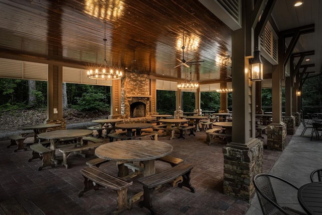 803 Night Fire Dr, Dawsonville, GA 30534 - view of patio / terrace with an outdoor stone fireplace and ceiling fan