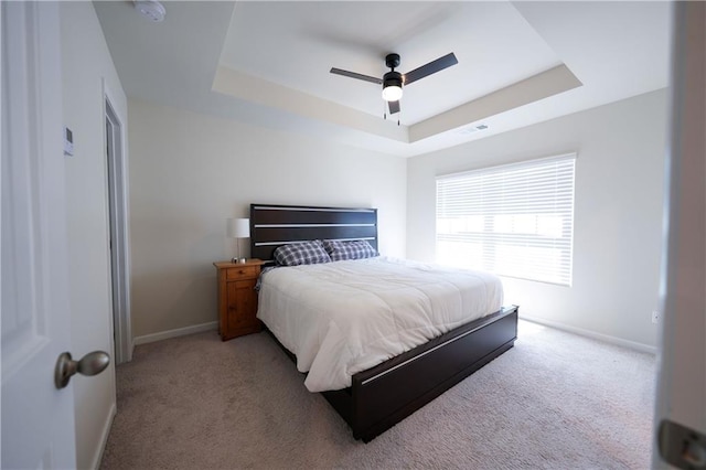 458 Bishop Ln, Woodstock, GA 30188 - bedroom with a raised ceiling, light colored carpet, baseboards, and a ceiling fan