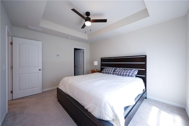 458 Bishop Ln, Woodstock, GA 30188 - bedroom featuring a raised ceiling, light colored carpet, baseboards, and ceiling fan