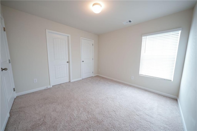 458 Bishop Ln, Woodstock, GA 30188 - unfurnished bedroom featuring carpet and baseboards